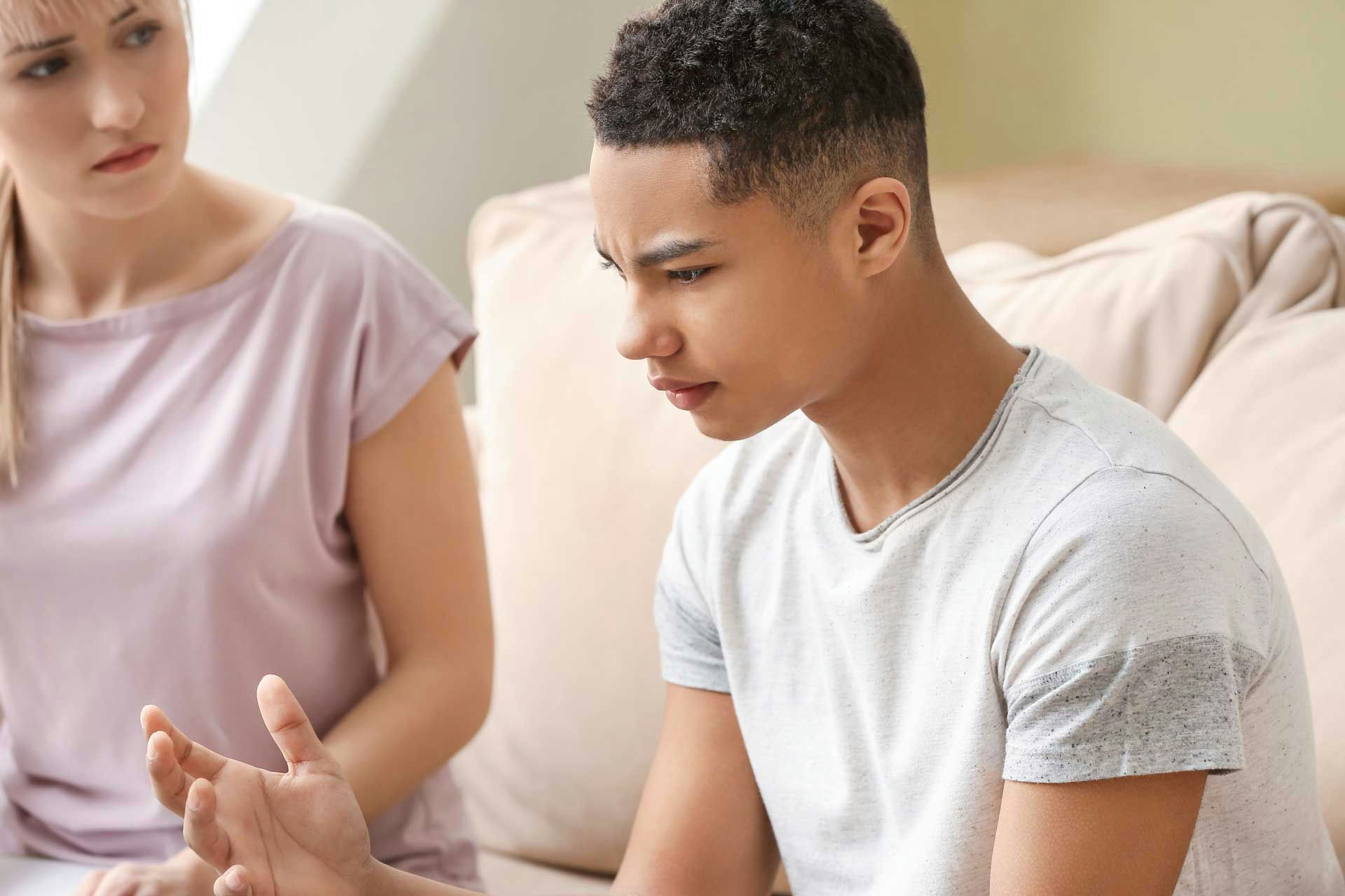 therapist guiding teen boy through treatment for co-occurring disorders