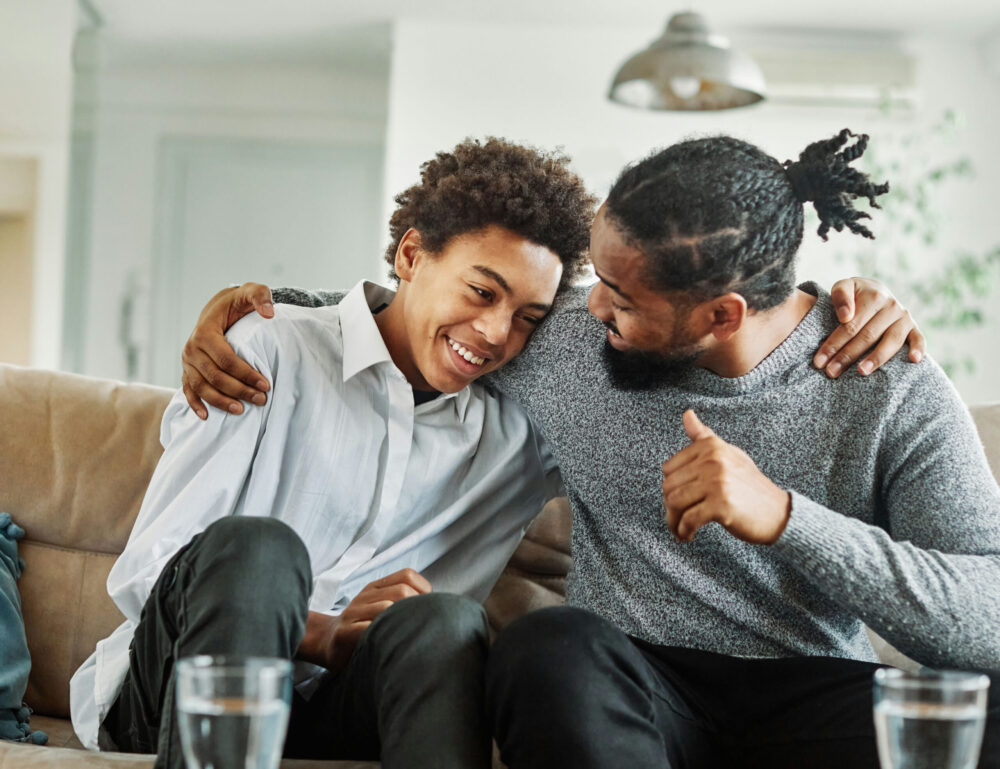 a-teen-boy-hugging-his-dad