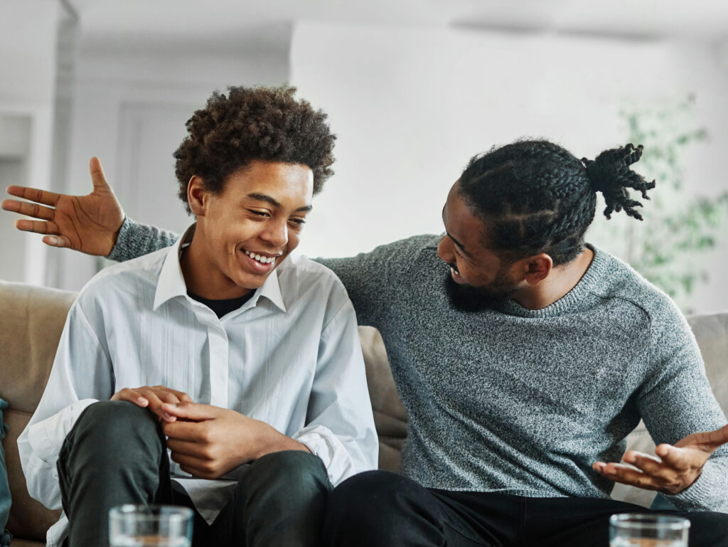 a-teen-boy-smiling-with-his-dad