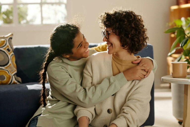 a-teen-girl-hugging-her-mom