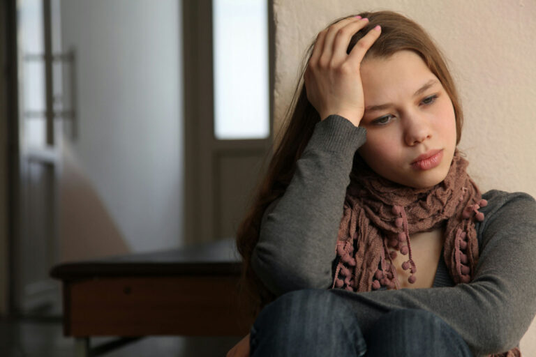 a-teen-girl-with-hand-on-head
