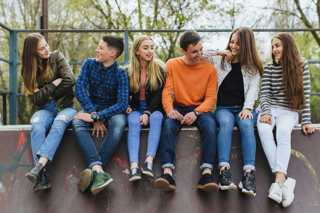 a-group-of-teens-hanging-outside
