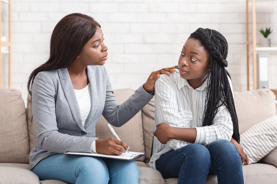 a-teen-girl-being-comforted-in-individual-therapy